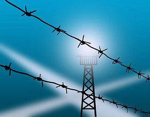 Image showing barbed wire on turn blue background