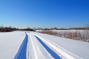 Image showing snow road near winter of the villages