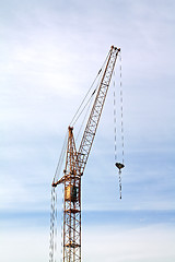 Image showing building crane on cloudy background