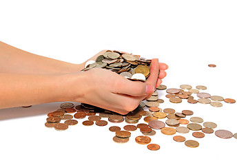 Image showing coins in hand on white background