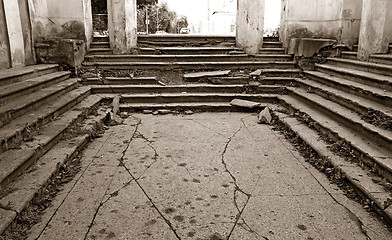 Image showing aging stairway in destroyed building, sepia 