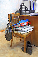 Image showing files on chair in office