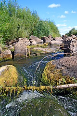 Image showing quick river flow amongst stone