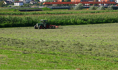 Image showing works in a field