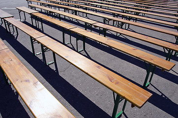 Image showing Wooden benches placed in square for meeting. 