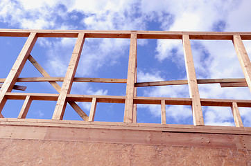 Image showing Newly constructed wooden frame house fragment. 