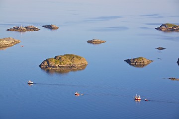 Image showing Fishing boats and tiny islands