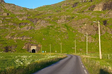 Image showing Narrow road leading into tunnel