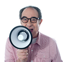 Image showing Excited old man making an announcement