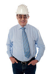 Image showing Successful aged builder posing in style