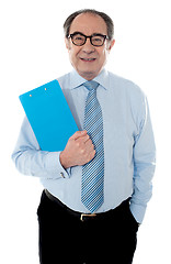 Image showing Welldress corporate person holding document
