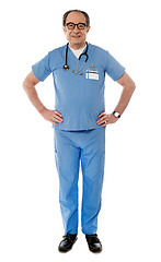 Image showing Full length view of smiling experienced medical professional