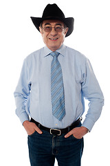 Image showing Portrait of a senior cowboy wearing hat