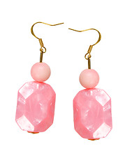 Image showing Earrings made of pink plastic on a white background