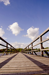 Image showing long walk wooden sirvenos lake bridge in astravas 