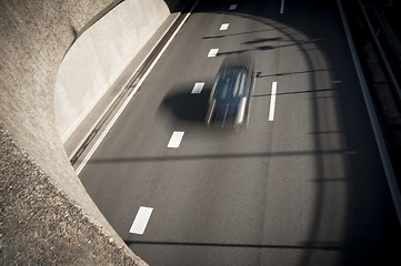 Image showing Car in blurry motion on highway