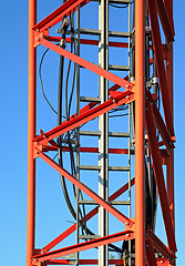 Image showing red antenna on blue background