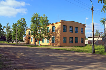 Image showing yellow building on rural street