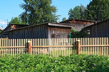 Image showing new wooden fence in rural vegetable garden