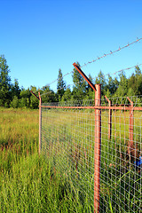 Image showing fence on green field