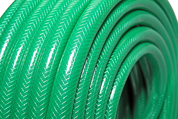 Image showing green hose on white background