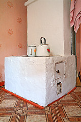 Image showing brick stove in rural wooden house