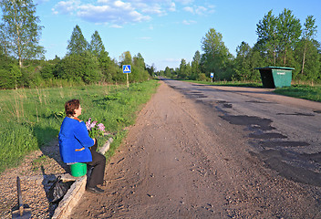 Image showing bus stop on rural road