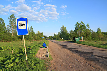 Image showing bus stop on rural road