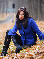 Image showing Young woman in the autumn park