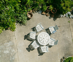 Image showing Table and chairs in the backyard