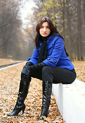 Image showing Young woman in the autumn park