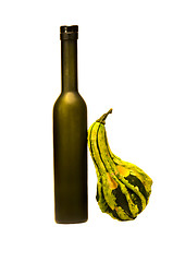 Image showing decorative glass bottle  pumpkin zucchini isolated 