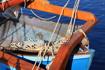 Image showing details of an old fishing boat sailing out of wood