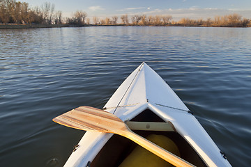 Image showing canoe bow and paddle