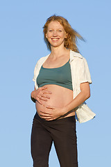 Image showing pregnant woman on meadow