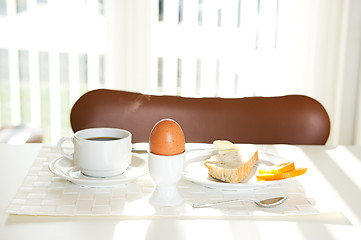 Image showing Coffee, bread and eggs for breakfast