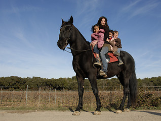 Image showing riding family