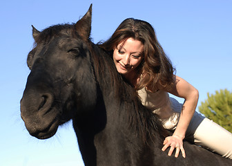 Image showing woman and horse