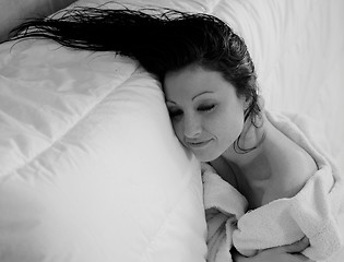 Image showing smiling woman in bathrobe