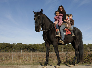 Image showing riding family