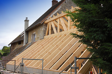 Image showing construction of the wooden frame of a roof