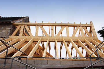 Image showing construction of the wooden frame of a roof