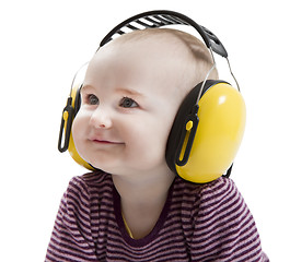 Image showing young child with ear protector