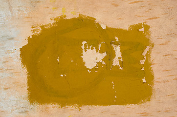 Image showing background of ancient partly yellow painted wall. 