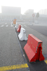 Image showing city in morning fog. concrete lower road barriers 