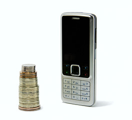 Image showing cell phone and a column of coins