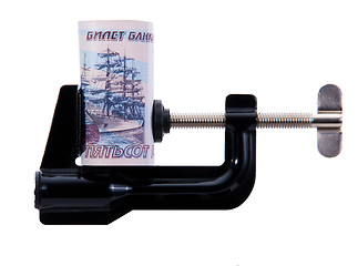 Image showing twisting banknotes is trapped in the clamp
