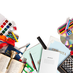 Image showing school supplies are scattered on a white sheet