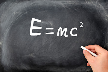 Image showing Relativity formula written on a  Blackboard background