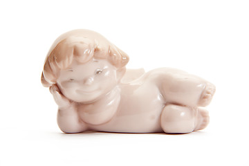 Image showing figurine of angel lying on white background